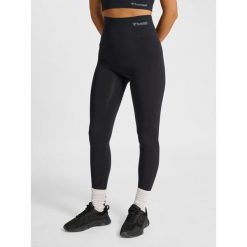 Rajstopy damskie z wysoką talią Hummel hmltif. Czarne legginsy sportowe damskie Hummel, l, bez wzorów, na fitness i siłownię. Za 145.50 zł.