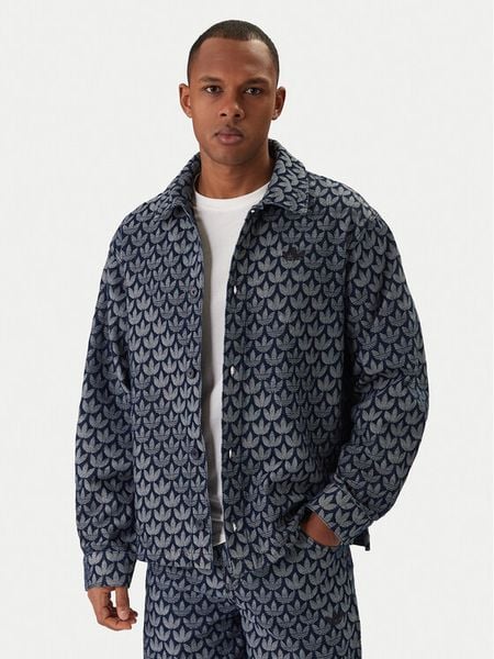 Adidas Koszula jeansowa Monogram KD0397 Niebieski Loose Fit. Niebieskie koszule męskie Adidas, m, bez wzorów, z bawełny, bez kołnierzyka, bez ramiączek. Za 324.99 zł.