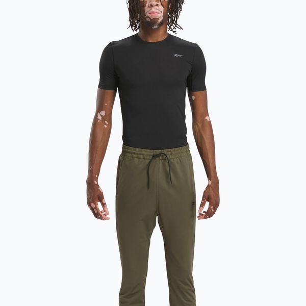 Koszulka męska Reebok Compression Tee. Czarne koszulki sportowe męskie Reebok, na lato, m, bez wzorów, z elastanu, bez kołnierzyka, bez ramiączek. Za 99.99 zł.