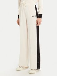Guess Spodnie dresowe V5RB00 KCO72 Écru Regular Fit. Spodnie dresowe damskie Guess, m, z aplikacjami, z dresówki. Za 229.99 zł.