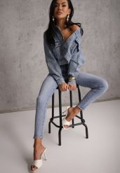 Niebieskie Jeansy Typu Skinny z Bawełny Nevitaes. Niebieskie jeansy damskie Renee, z podwyższonym stanem. Za 99.99 zł.