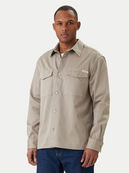Calvin Klein Jeans Koszula Utility LV04RF408G Beżowy Relaxed Fit. Brązowe koszule męskie Calvin Klein Jeans, m, bez wzorów, z jeansu, bez kołnierzyka, bez ramiączek. Za 345.99 zł.