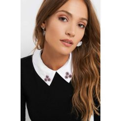 Sweter z kołnierzem. Czarne swetry damskie Orsay, z bawełny, z kontrastowym kołnierzykiem. Za 99.99 zł.