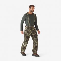 Spodnie z szelkami Solognac 900 Warm wodoodporne camo treemetic. Brązowe spodnie sportowe męskie SOLOGNAC, m, bez wzorów, ze skóry, outdoorowe. Za 549.99 zł.