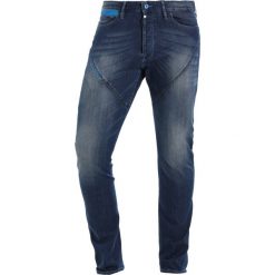 Dynafit Spodnie materiałowe jeans blue. Spodnie materiałowe męskie marki Dynafit. W wyprzedaży za 458.10 zł.