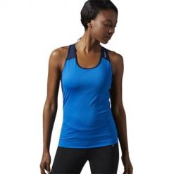 Koszulka treningowa damska Reebok Racerback. Niebieskie koszulki sportowe damskie Reebok, s, bez wzorów, z materiału, bez kołnierzyka, bez ramiączek, na fitness i siłownię. Za 139.99 zł.