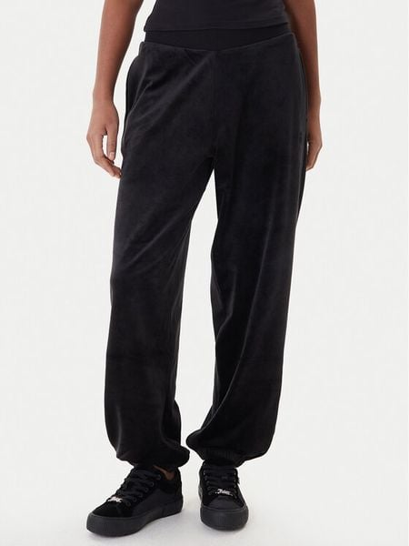 Juicy Couture Spodnie dresowe Davidson JCBBJ224811 Czarny Regular Fit. Czarne spodnie dresowe damskie Juicy Couture, xs, bez wzorów, z dresówki. Za 429.99 zł.