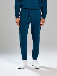 Spodnie regular fit - zielony. Zielone spodnie materiałowe męskie Sinsay, l, bez wzorów. Za 49.99 zł.