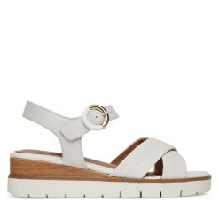 Sandały Tamaris. Białe sandały damskie Tamaris, bez wzorów, bez obcasa, na koturnie, bez zapięcia. Za 209.99 zł.