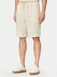 Guess Szorty sportowe F6GD03 kremKG362 Kremowy Regular Fit. Białe krótkie spodenki sportowe męskie Guess, m, z aplikacjami, z syntetyku. Za 264.99 zł.
