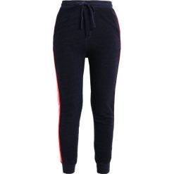 Sundry SIDE STRIPES Spodnie treningowe navy. Spodnie sportowe damskie marki Sundry. Za 829.00 zł.