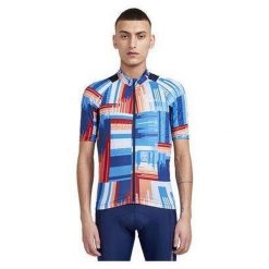 Koszulka Craft ADV Endur Graphic. Niebieskie buty sportowe męskie Craft, bez wzorów, bez kołnierzyka, bez ramiączek, rowerowe. W wyprzedaży za 299.85 zł.