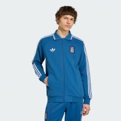 Wyjazdowa bluza reprezentacyjna Grecja. Niebieskie bluzy męskie Adidas, xs, bez wzorów, z bawełny, bez kaptura, do piłki nożnej. Za 529.00 zł.