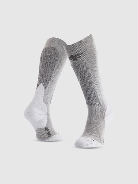 4F Skarpety narciarskie z wełną merino damskie - szare 35-38. Szare skarpety damskie 4f, bez wzorów, prążkowane. Za 99.99 zł.