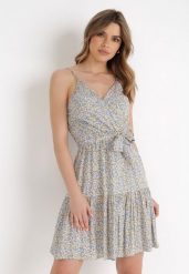 Niebiesko-Żółta Sukienka Zotemus. Niebieskie sukienki damskie Born2be, m, bez wzorów, z materiału, bez kołnierzyka, bez ramiączek, mini, dopasowane. Za 29.99 zł.