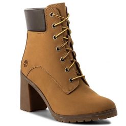 Trzewiki Timberland. Żółte botki damskie Timberland, bez obcasa, na słupku, bez zapięcia. Za 659.99 zł.