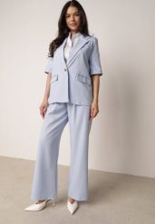 Jasnoniebieski Garniturowy Komplet Marynarka na Krótki Rękaw i Szerokie Spodnie Amalilia. Niebieskie spodnie materiałowe damskie Born2be, s, bez wzorów, z szyfonu, biznesowe. Za 229.99 zł.