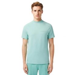 Koszulka męska Lacoste TH6702. Zielone koszulki sportowe męskie Lacoste, m, bez wzorów, z bawełny, bez kołnierzyka, bez ramiączek. Za 217.00 zł.