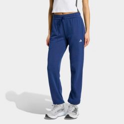 Spodnie fitness damskie ADIDAS. Niebieskie spodnie dresowe damskie Adidas, m, bez wzorów, z dresówki, na fitness i siłownię. Za 199.99 zł.