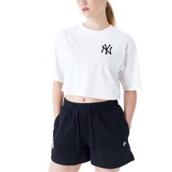 Nowa Koszulka Mlb Le Crop Tee Neyyan Whiblk Damskie. Białe t-shirty damskie New Era, l, bez wzorów, z bawełny, casualowe, bez kołnierzyka. Za 268.00 zł.