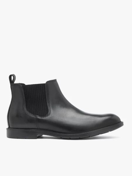 Czarne sztyblety ze skóry licowej. Czarne botki męskie Ryłko, ze skóry, eleganckie, za kostkę, bez zapięcia. Za 529.99 zł.