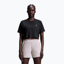 Koszulka treningowa damska On Train-T Crop black. Czarne koszulki sportowe damskie On, l, bez wzorów, z materiału, bez kołnierzyka, bez ramiączek, na fitness i siłownię. Za 339.99 zł.