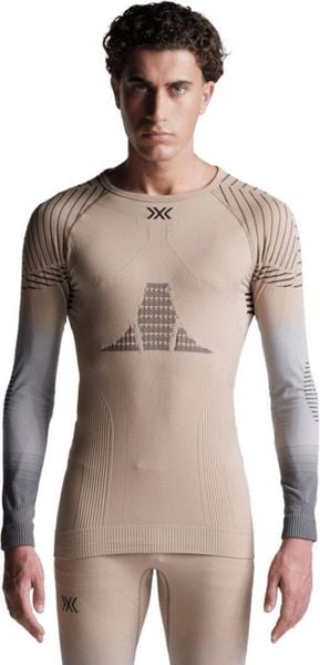 Koszulka męska X-Bionic INVENT GRAPHICS SHIRT LS MEN SAND/LIGHT GREY/GREY. Brązowe koszulki sportowe męskie X Bionic, m, bez wzorów, bez kołnierzyka, bez ramiączek, na fitness i siłownię. Za 400.00 zł.