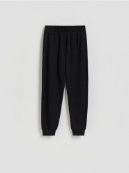 Spodnie dresowe ze ściągaczem - czarny. Czarne spodnie dresowe damskie Reserved, l, bez wzorów, z bawełny. Za 79.99 zł.