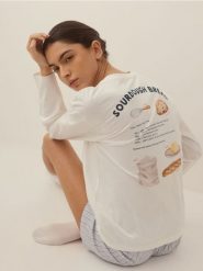 Dwuczęściowa piżama z haftem i nadrukiem - jasnoniebieski. Niebieskie piżamy damskie Reserved, l, bez wzorów, z bawełny, bez ramiączek. Za 109.99 zł.