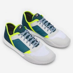 Tenisówki pokładowe żeglarskie męskie Decathlon 500. Niebieskie trampki męskie Decathlon, bez wzorów, z gumy, klasyczne, bez zapięcia. Za 119.99 zł.