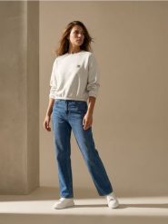 Spodnie jeansowe wide straight leg z efektem sprania - granatowy. Niebieskie spodnie sportowe damskie Sinsay, l, bez wzorów, z jeansu. Za 49.99 zł.
