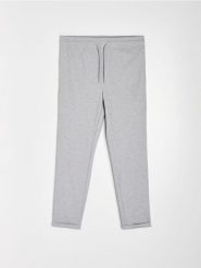 Spodnie jogger slim fit z domieszką wiskozy - szary. Szare spodnie sportowe męskie Sinsay, l, bez wzorów, z wiskozy. Za 49.99 zł.