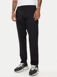 New Balance Spodnie materiałowe Athletics Standard MP43554BK Czarny Regular Fit. Czarne spodnie materiałowe męskie New Balance, m, bez wzorów, z bawełny. Za 249.99 zł.