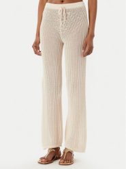 Guess Spodnie plażowe E6GB00 Z5371 Beżowy jasny Regular Fit. Brązowe spodnie materiałowe damskie Guess, l, z aplikacjami, z bawełny. Za 394.99 zł.