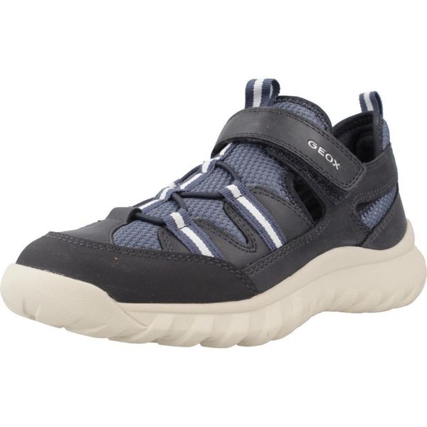 Sandały GEOX J SIMBYOS BOY Niebieski. Niebieskie sandały męskie Geox, z materiału, bez zapięcia. Za 165.99 zł.
