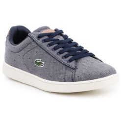 Buty lifestylowe Lacoste Carnaby Evo 218 3 Spw W 7-35SPW0018B98 białe. Białe trampki i tenisówki damskie bez wzorów, z materiału, bez zapięcia. Za 544.84 zł.