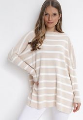 Beżowy Sweter Oversize w Paski z Rękawami Nietoperz Caelania. Brązowe swetry damskie Born2be, bez wzorów, bez kołnierzyka, bez ramiączek, bez kaptura. Za 109.99 zł.