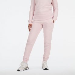 Spodnie damskie New Balance WP03805SOI – różowe. Czerwone spodnie sportowe damskie New Balance, m, bez wzorów, z bawełny. Za 99.99 zł.