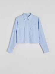 Krótka koszula z aplikacjami ze strasu - jasnoniebieski. Niebieskie koszule damskie Reserved, l, z aplikacjami, z bawełny, bez kołnierzyka, bez ramiączek. W wyprzedaży za 89.99 zł.