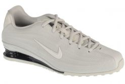Buty sportowe Sneakersy damskie, Shox Z. Brązowe obuwie sportowe damskie Nike, bez wzorów, z materiału, trekkingowe. Za 459.99 zł.
