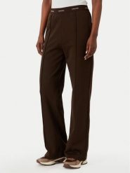 Calvin Klein Jeans Spodnie dresowe LV047G253G Brązowy ciemny Relaxed Fit. Brązowe jeansy damskie Calvin Klein Jeans. Za 409.99 zł.