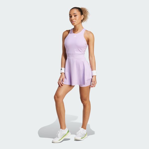 Sukienka Tennis Climacool Y-Dress. Czerwone sukienki damskie Adidas, l, bez wzorów, sportowe, bez kołnierzyka, bez ramiączek, dopasowane. Za 369.00 zł.