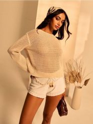 Swetrowe prążkowane szorty z ozdobnym wiązaniem - kremowy. Białe szorty damskie Sinsay, l, bez wzorów, prążkowane. Za 49.99 zł.