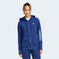 Bluza z kapturem damska ADIDAS fitness. Niebieskie bluzy damskie Adidas, l, bez wzorów, z materiału, z kapturem, na fitness i siłownię. Za 199.99 zł.