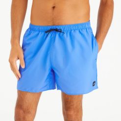 Spodenki surfingowe krótkie męskie Olaian 100 15" Hendaia Pockets. Niebieskie kąpielówki męskie OLAIAN, m, bez wzorów, z materiału. Za 34.99 zł.