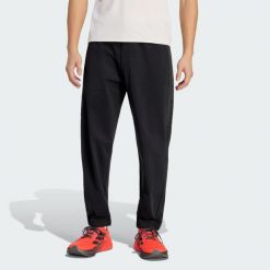 Spodnie Audi Revolut F1 Team Engineers & Marketing. Czarne buty sportowe męskie Adidas, bez zapięcia, na fitness i siłownię. Za 599.00 zł.