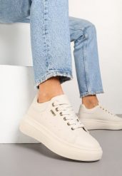 Beżowe Sneakersy na Niskim Koturnie Zdobione Metalicznymi Wstawkami Alirisa. Brązowe obuwie sportowe damskie Renee, z aplikacjami, z jeansu. Za 74.99 zł.