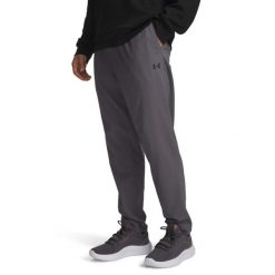 Spodnie treningowe Under Armour Vanish Training 6010606. Czarne spodnie sportowe męskie Under Armour, l, bez wzorów, z materiału, na fitness i siłownię. Za 306.30 zł.