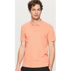 Klasyczna koszulka polo - Pomarańczo. Różowe koszulki polo męskie Reserved. Za 39.99 zł.