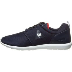 Sneakersy "Dynacomf" w kolorze granatowym. Niebieskie trampki męskie marki le coq sportif, bez wzorów. W wyprzedaży za 215.95 zł.